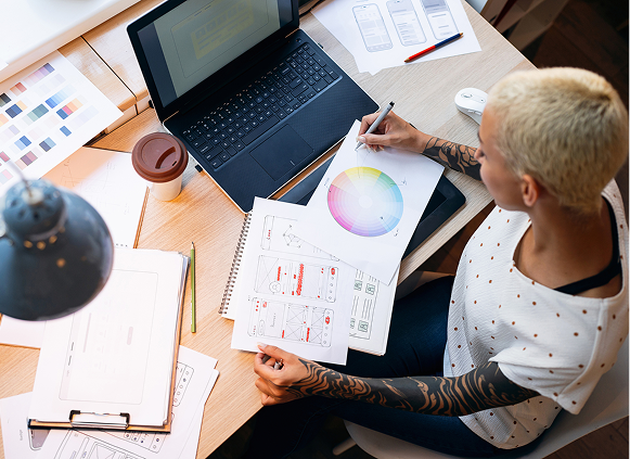 Designer working on color wheel