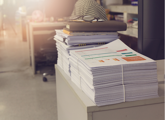 Office paperwork stacked neatly