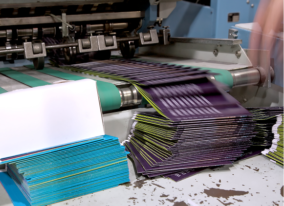 Industrial printer processing printed materials