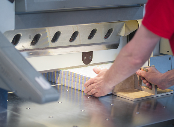 Paper cutting machine in action